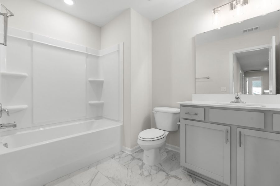 Representative furnished interior of a home built from the The Dalton by Smith Family Homes in Ramsey Landing, Rincon (Image 10).