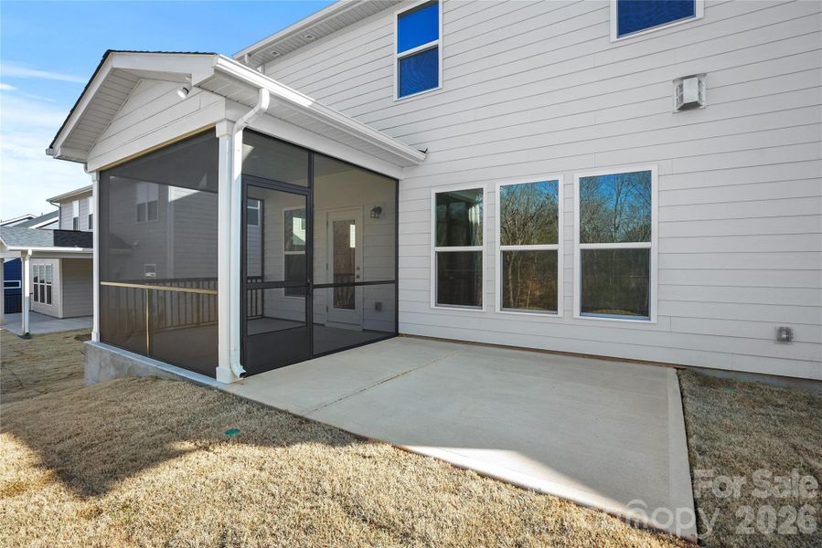 Exterior details and patio area of a home in Forest Creek, Waxhaw (Image 26).