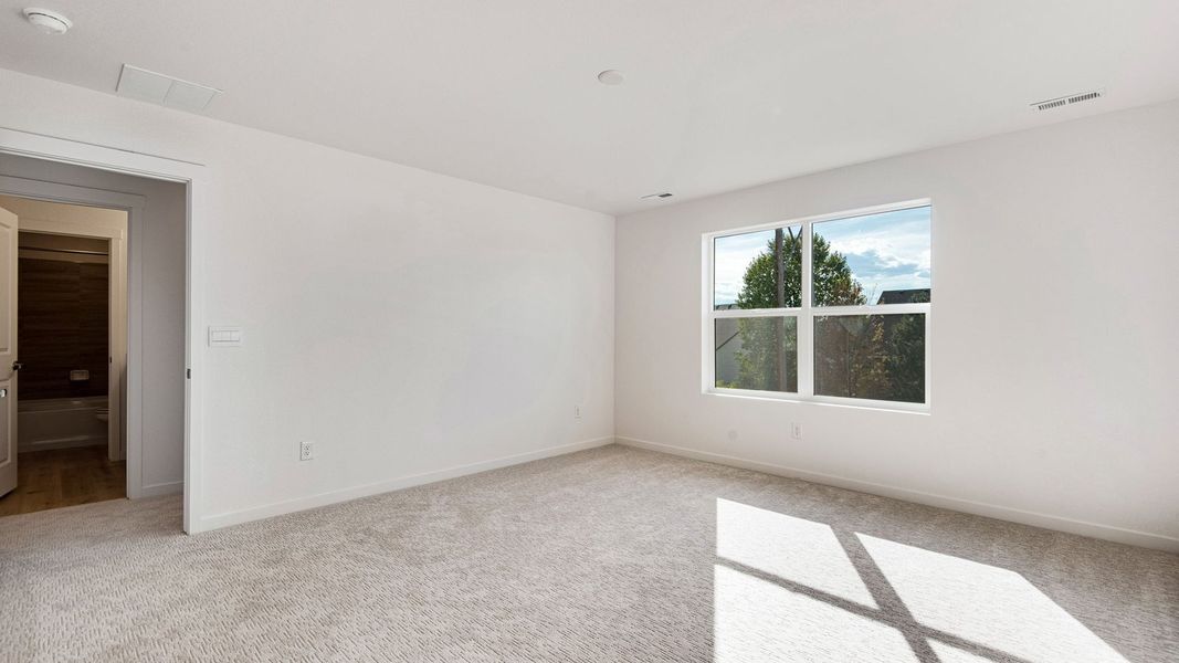 Spacious, unfurnished interior of a new home in Trails at Crowfoot, Parker (Image 22).