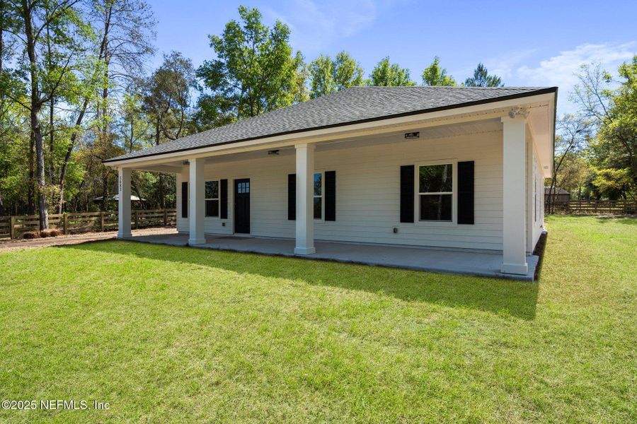 Front exterior of a new home in , Keystone Heights, FL, highlighting curb appeal (Image 1).