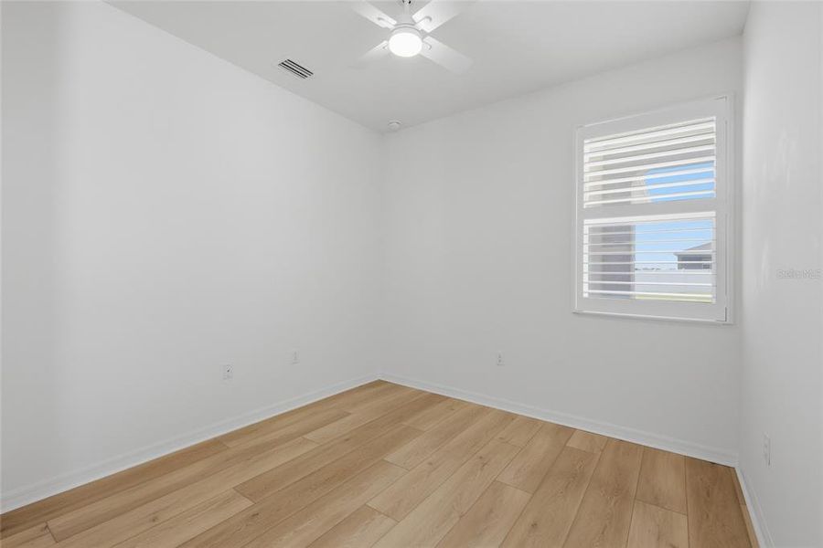 Spacious, unfurnished interior of a new home in Heron Bay, Palmetto (Image 34). Spacious, unfurnished interior of a new home in Heron Bay, Palmetto (Image 34).