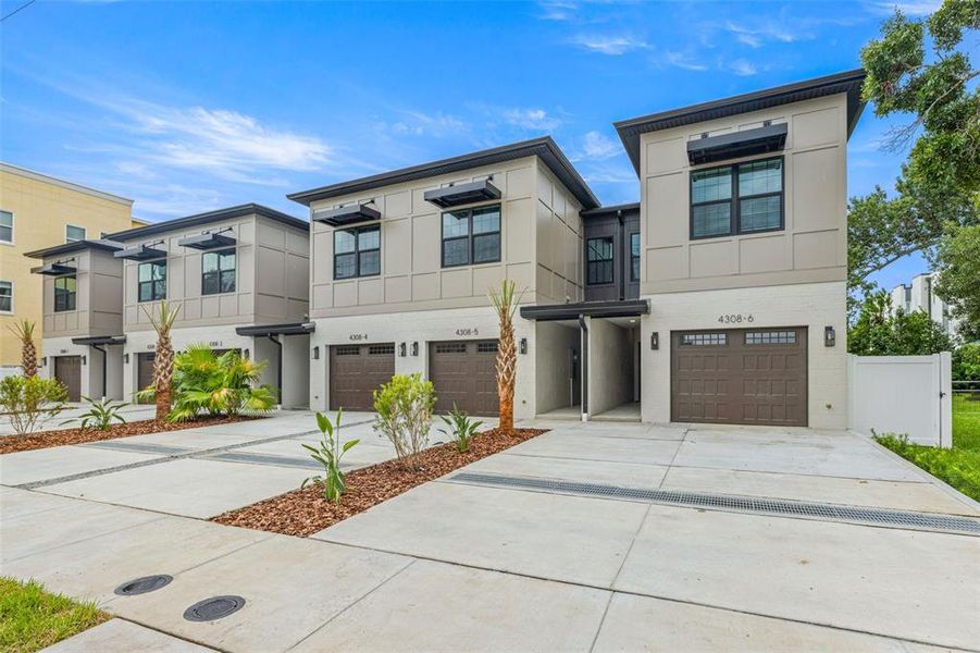 Front exterior of a new home in , Tampa, FL, highlighting curb appeal (Image 1). Front exterior of a new home in , Tampa, FL, highlighting curb appeal (Image 1).