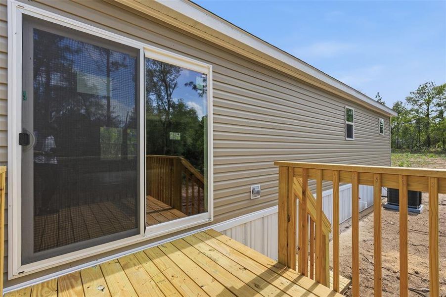 Exterior details and patio area of a home in , Williston (Image 19).