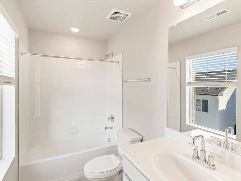 Furnished interior view inside a new home in Three Hills, Morrison (Image 5).