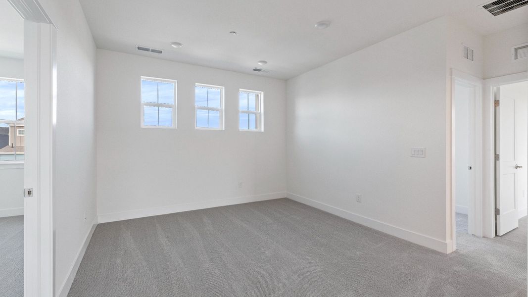 Furnished interior view inside a new home in Dillon Pointe - Journey, Broomfield (Image 22).