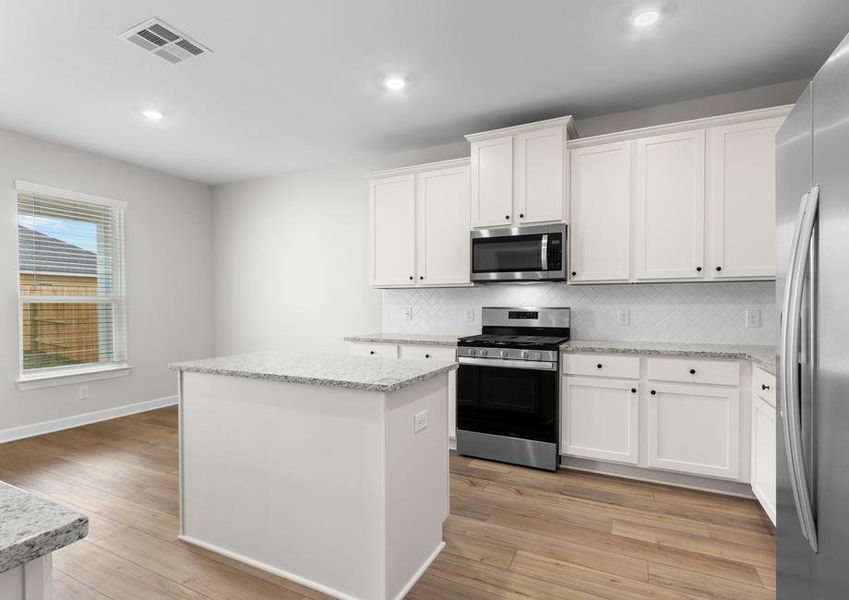 This open kitchen is perfect for cooking together.