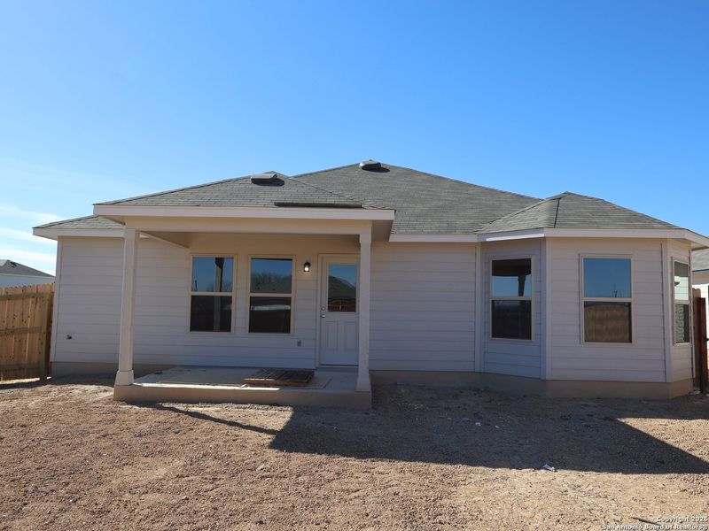 Exterior details and patio area of a home in Greenspoint Heights, San Antonio (Image 4).