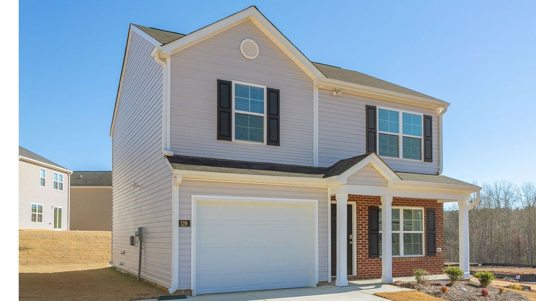 Front exterior of a new home in Hobbs Farm, Ayden, NC, highlighting curb appeal (Image 20).