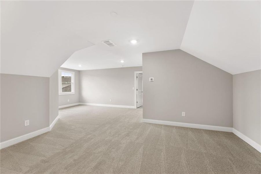 Spacious, unfurnished interior of a new home in The Courtyards at Bailey Farm, Dacula (Image 10).