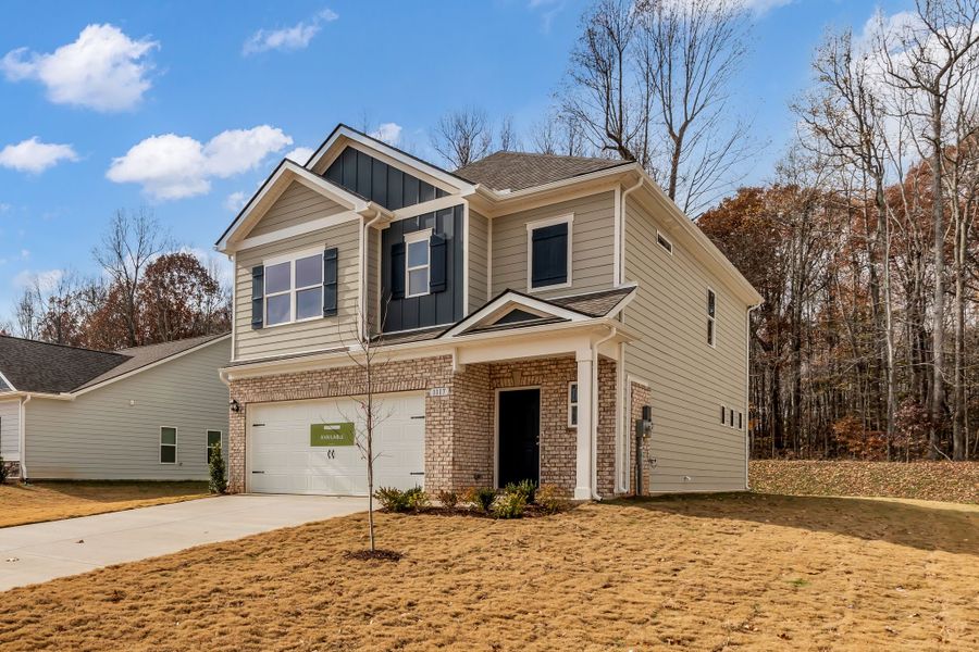 Front exterior of a new home in Marlin Pointe, White House, TN, highlighting curb appeal (Image 2). Front exterior of a new home in Marlin Pointe, White House, TN, highlighting curb appeal (Image 2).