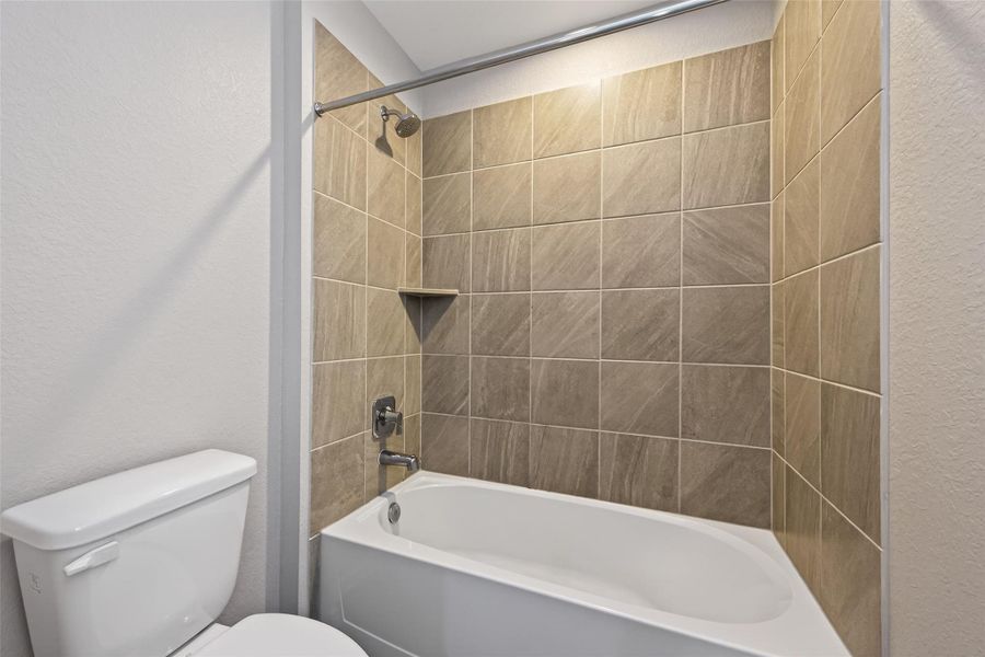 Furnished interior view inside a new home in Water Crest on Lake Conroe, Conroe (Image 12).