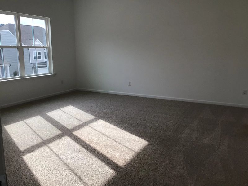 Primary Bed featuring the AW Collection® Coastal - A serene space with soft textures and light.