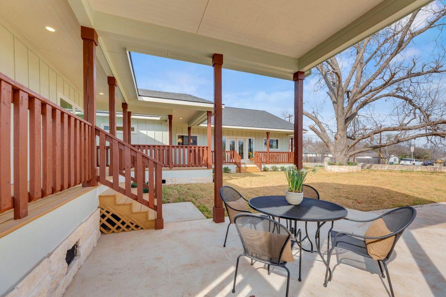 Front patio of breezeway. Carport.