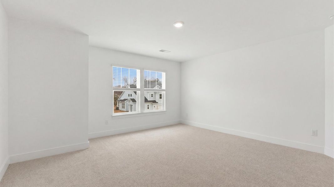 Furnished interior view inside a new home in Village at Midway, Anderson (Image 25).