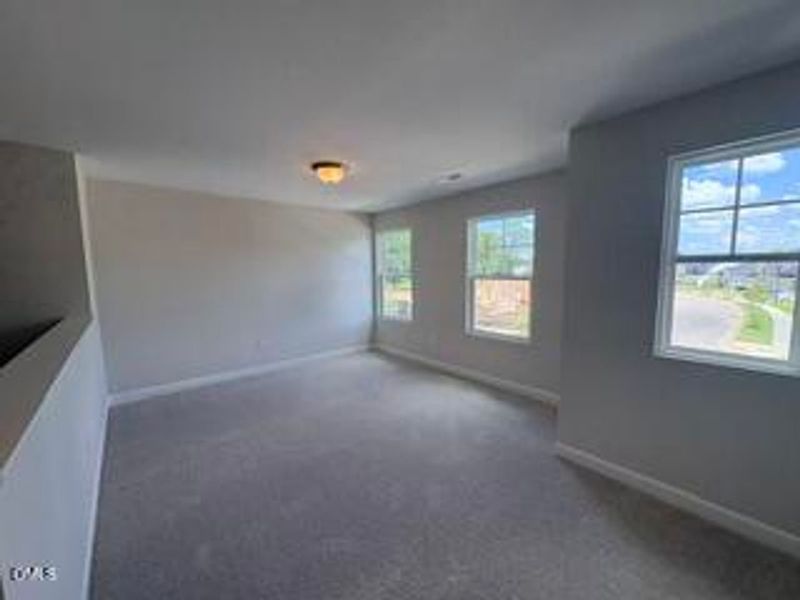 Spacious, unfurnished interior of a new home in Woodland Crossing, Zebulon (Image 17).