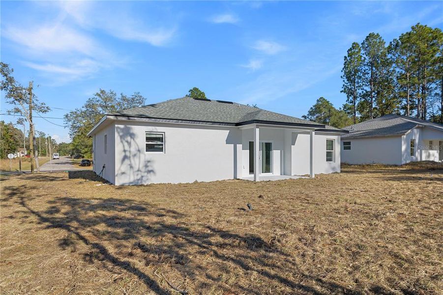 Exterior details and patio area of a home in , Citrus Springs (Image 21).