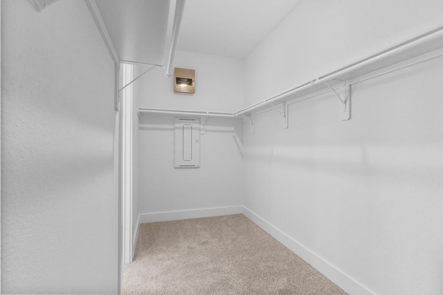 Another view of the oversized primary closet, offering plenty of room for seasonal wardrobes and personal storage. **Image Representative of Plan Only and May Vary as Built**.