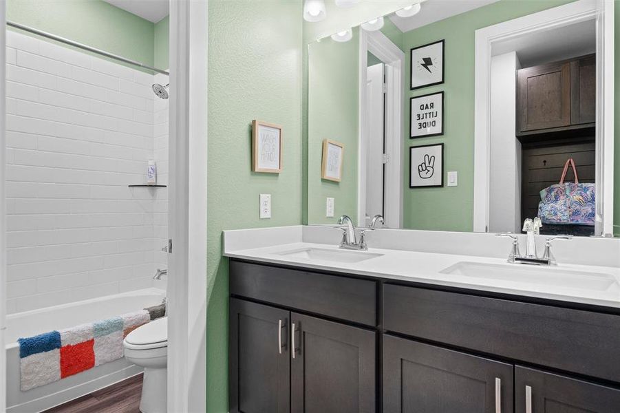 A full bath for the secondary bedroom wing.