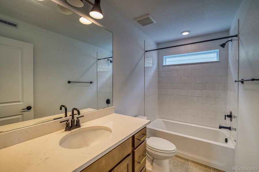 Furnished interior view inside a new home in Harvest Crossing, Aurora (Image 7). Furnished interior view inside a new home in Harvest Crossing, Aurora (Image 7).
