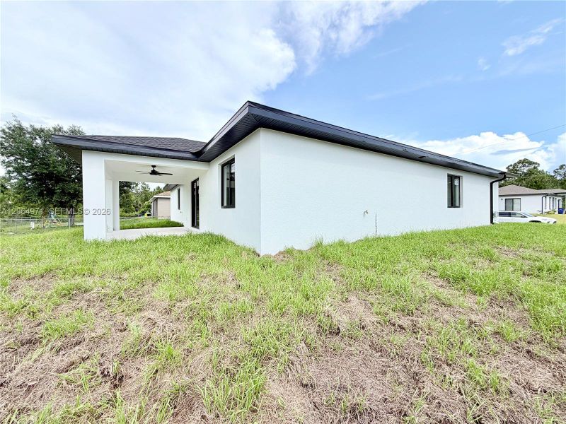 Exterior details and patio area of a home in , Lehigh Acres (Image 31).