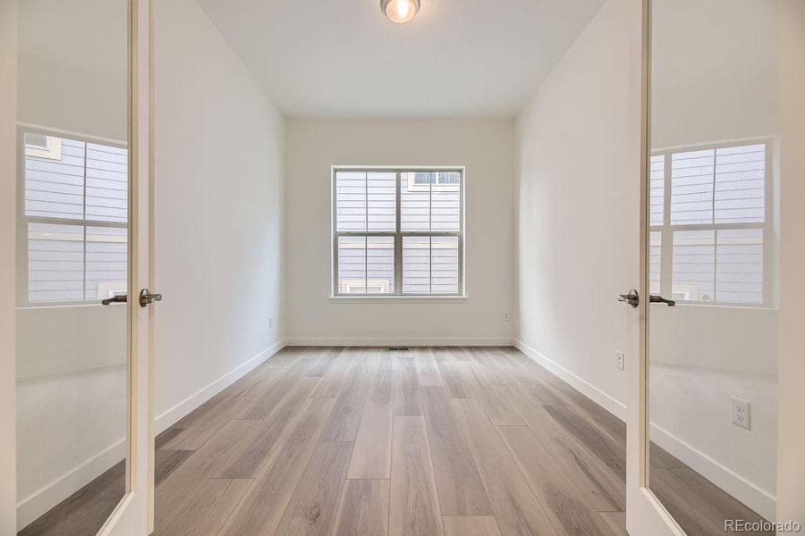 Spacious, unfurnished interior of a new home in Red Rocks Ranch: The Grand Collection, Morrison (Image 9).