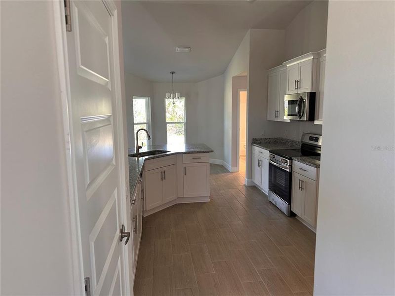 Furnished interior view inside a new home in South Gulf Cove, Port Charlotte (Image 6).