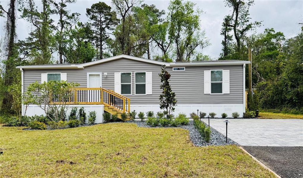 Front exterior of a new home in , White Springs, FL, highlighting curb appeal (Image 30).