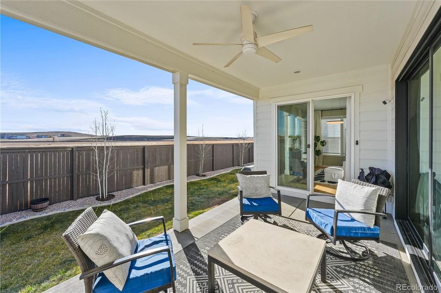 Exterior details and patio area of a home in Settler's Crossing, Commerce City (Image 21).