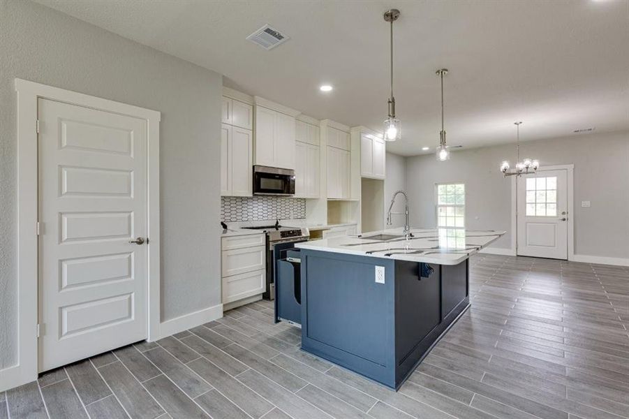 Furnished interior view inside a new home in , Ferris (Image 11).