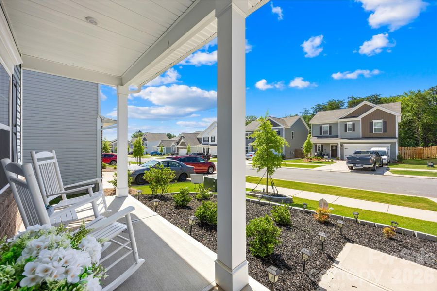 Exterior details and patio area of a home in Orchard Creek, Charlotte (Image 3).