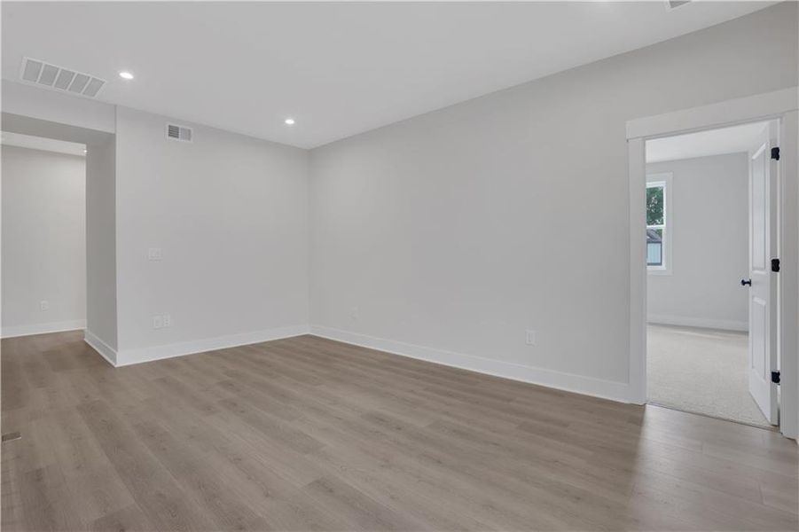 Spacious, unfurnished interior of a new home in The Paddocks at Doc Hughes, Buford (Image 26).