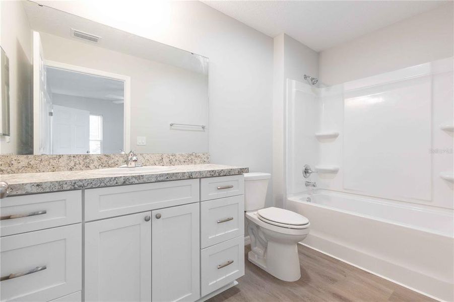 Furnished interior view inside a new home in , Bushnell (Image 9).
