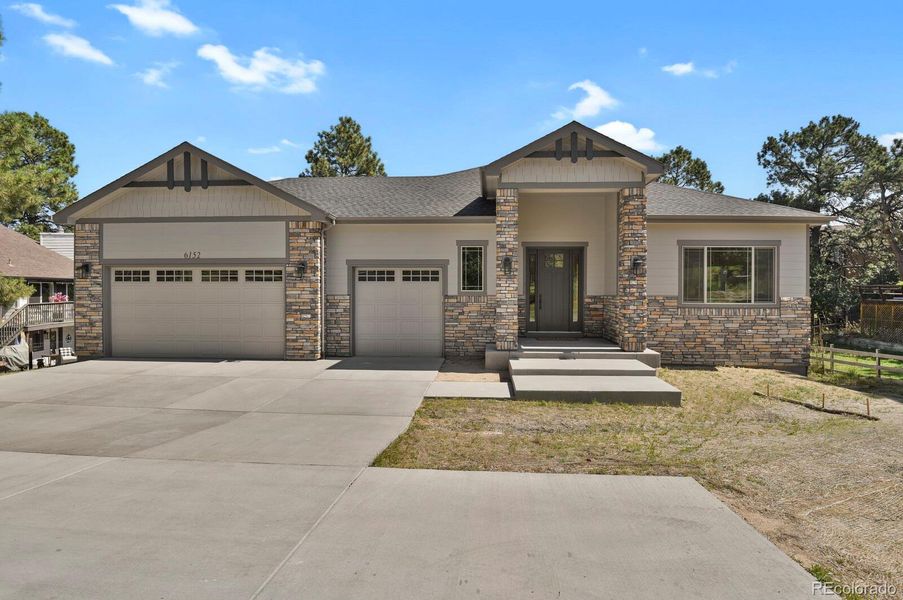 Front exterior of a new home in , Parker, CO, highlighting curb appeal (Image 25). Front exterior of a new home in , Parker, CO, highlighting curb appeal (Image 25).