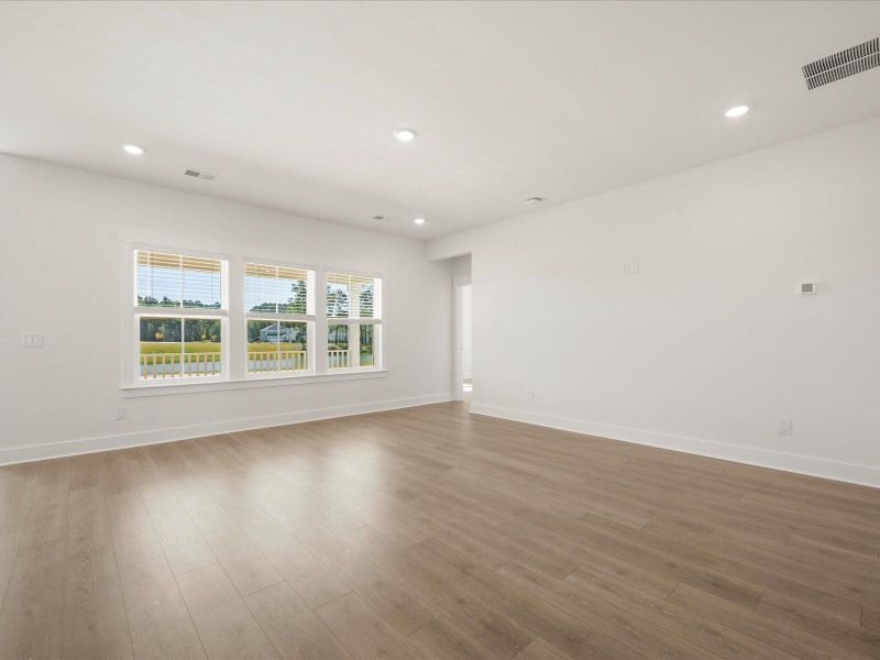 Spacious, unfurnished interior of a new home in The Coves at Lakes of Cane Bay II, Summerville (Image 25). Spacious, unfurnished interior of a new home in The Coves at Lakes of Cane Bay II, Summerville (Image 25).