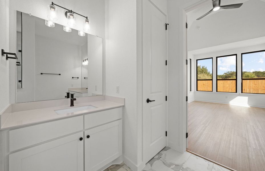 Representative furnished interior of a home built from the Dobbin by Pulte Homes in 6 Creeks, Kyle (Image 4).