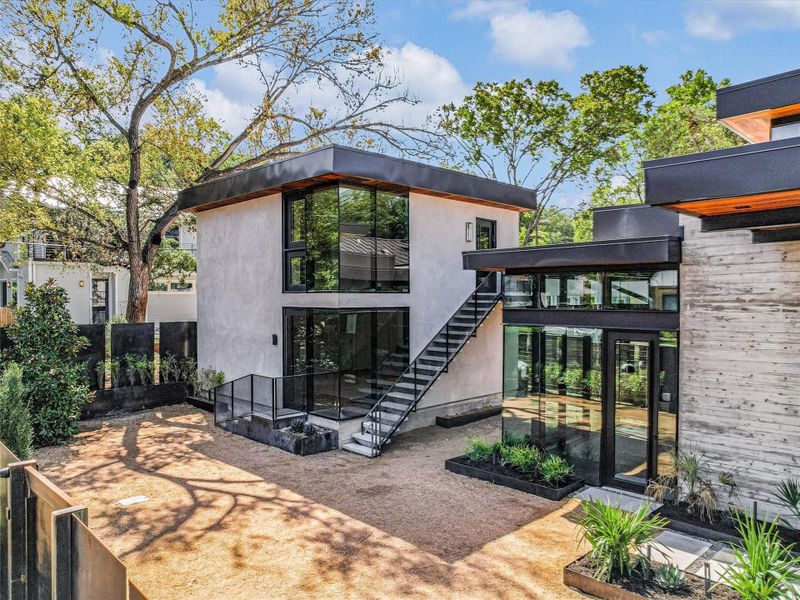 Front exterior of a new home in , Austin, TX, highlighting curb appeal (Image 23). Front exterior of a new home in , Austin, TX, highlighting curb appeal (Image 23).