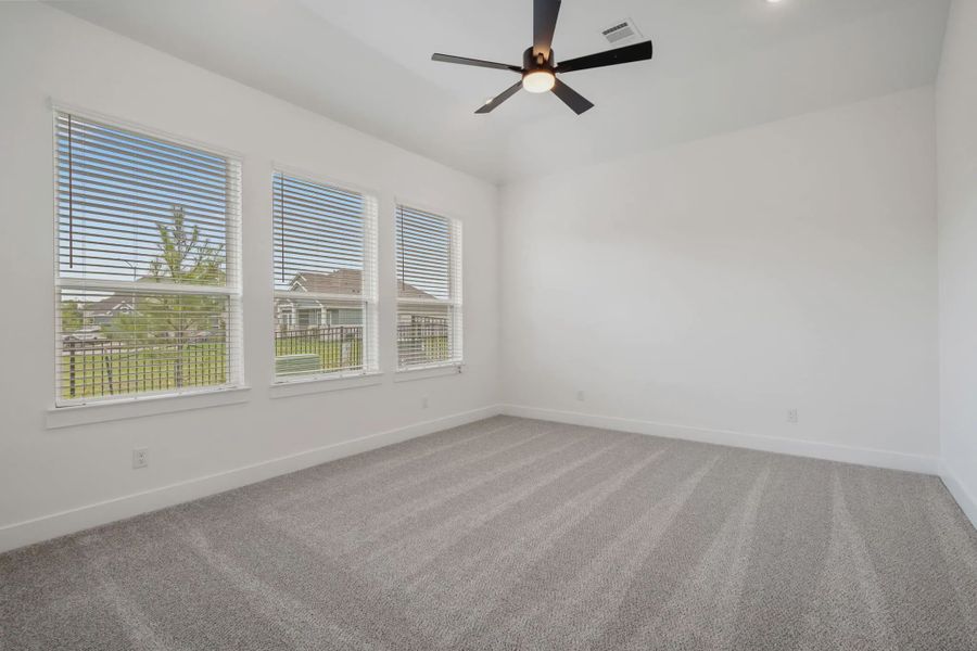 Representative unfurnished interior of a home built from the Malibu by Chesmar Homes in Fulshear Lakes, Fulshear (Image 28).