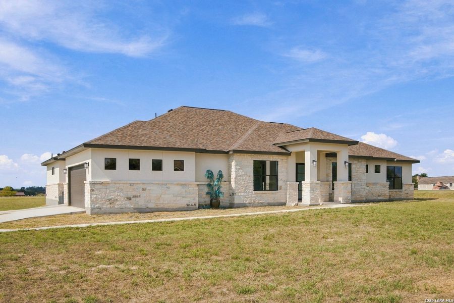 Exterior details and patio area of a home in , Floresville (Image 26).