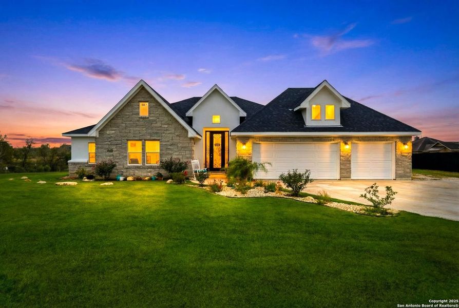 Front exterior of a new home in , Kyle, TX, highlighting curb appeal (Image 24). Front exterior of a new home in , Kyle, TX, highlighting curb appeal (Image 24).