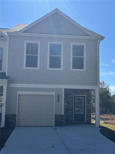 Front exterior of a new home in , College Park, GA, highlighting curb appeal (Image 1). Front exterior of a new home in , College Park, GA, highlighting curb appeal (Image 1).