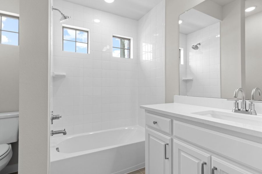 Furnished interior view inside a new home in The Tribute, The Colony (Image 34).