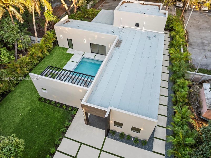 Exterior details and patio area of a home in , North Miami (Image 40).