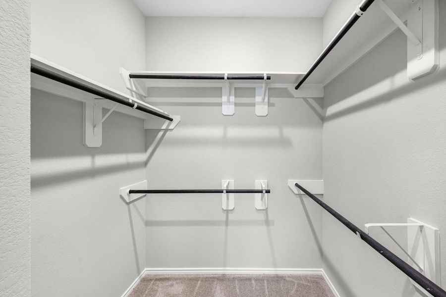 Walk-in closet primary closet!