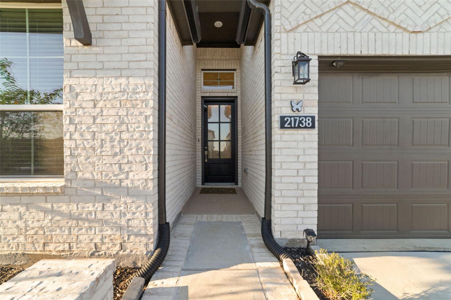 Exterior details and patio area of a home in Bridgeland 45's, Cypress (Image 23).