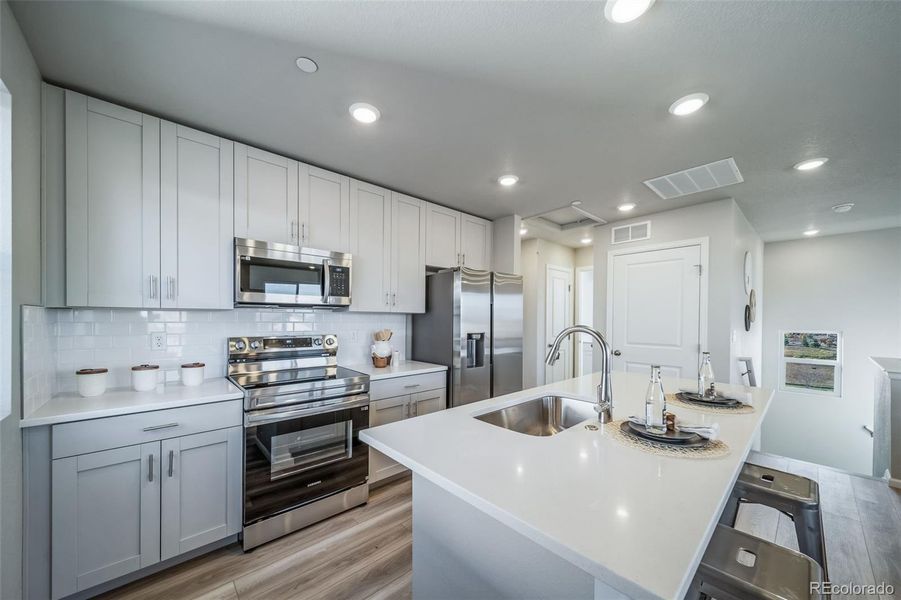 Furnished interior view inside a new home in , Commerce City (Image 7).