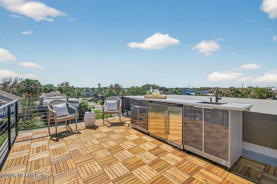 Exterior details and patio area of a home in , Neptune Beach (Image 4).