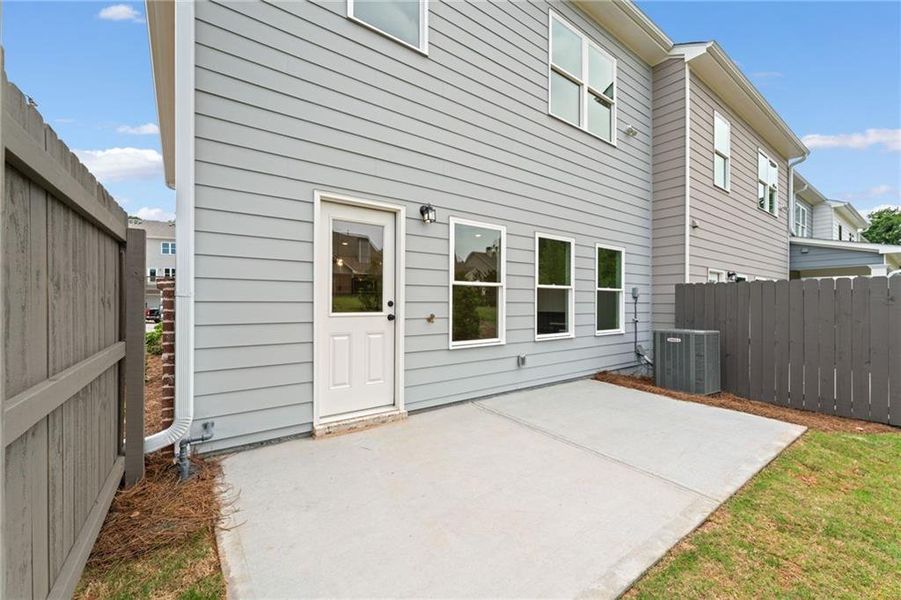 Front exterior of a new home in Wilkins Walk, Mableton, GA, highlighting curb appeal (Image 21).