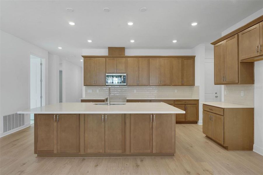 Furnished interior view inside a new home in Green Key Village, Lady Lake (Image 8).