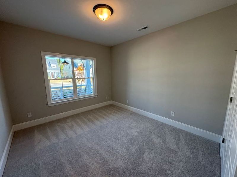 Spacious, unfurnished interior of a new home in Riverside Cove, Wilmington (Image 18).