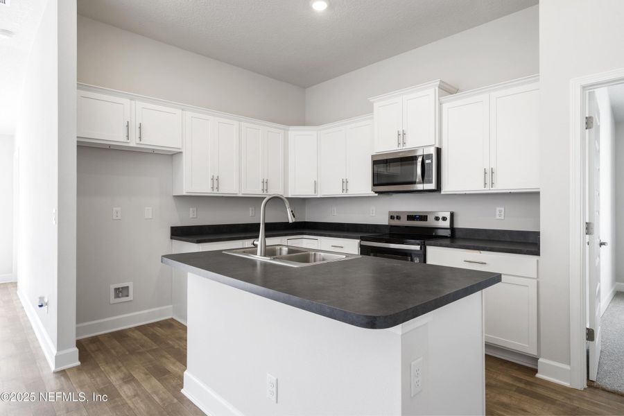 Furnished interior view inside a new home in Summerglen, Jacksonville (Image 9).
